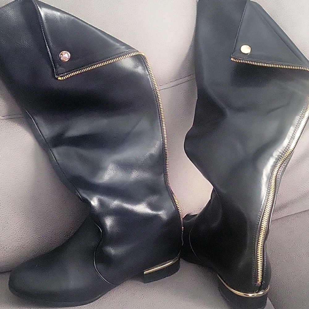 Womans black boots, with gold zippers